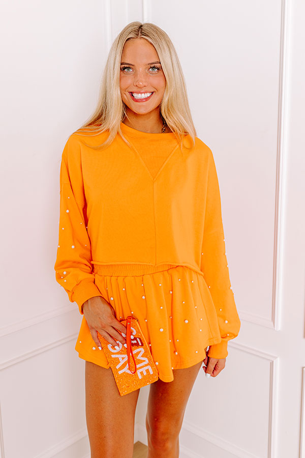 Ultimate Sideline Glam: Orange Pearl-Embellished Crop Sweatshirt